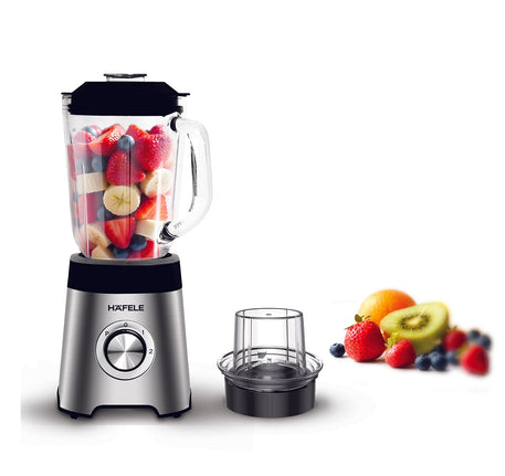 A blender with fruits in it

AI-generated content may be incorrect.