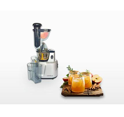 A juicer machine and glasses of juice

AI-generated content may be incorrect.