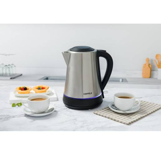 A coffee pot and cups on a counter

AI-generated content may be incorrect.