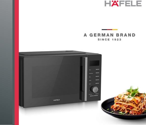 A black microwave and a plate of lasagna

AI-generated content may be incorrect.