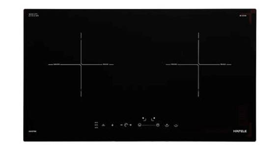 A black electric stove top

AI-generated content may be incorrect.