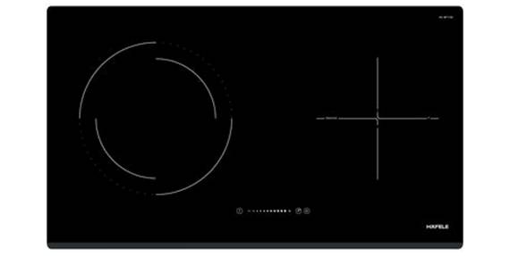 A black electric stove top

AI-generated content may be incorrect.